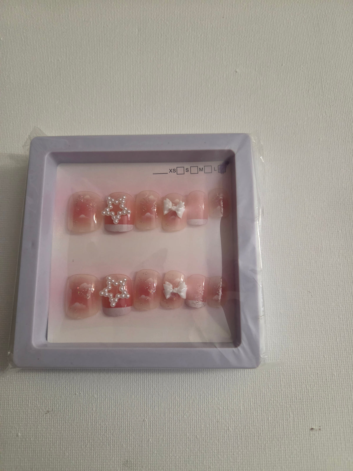 Hearts and butterflies press-on nail set - sheer pink with red hearts and pearl star charm
