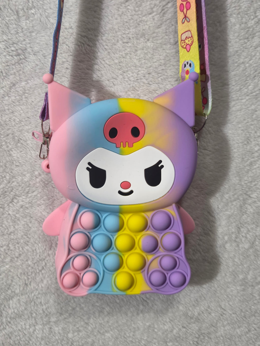 Rainbow Kuromi pop-it silicone crossbody bag back view showing pink silicone body