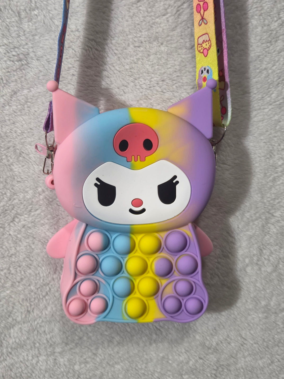 Rainbow Kuromi pop-it silicone crossbody bag back view showing pink silicone body