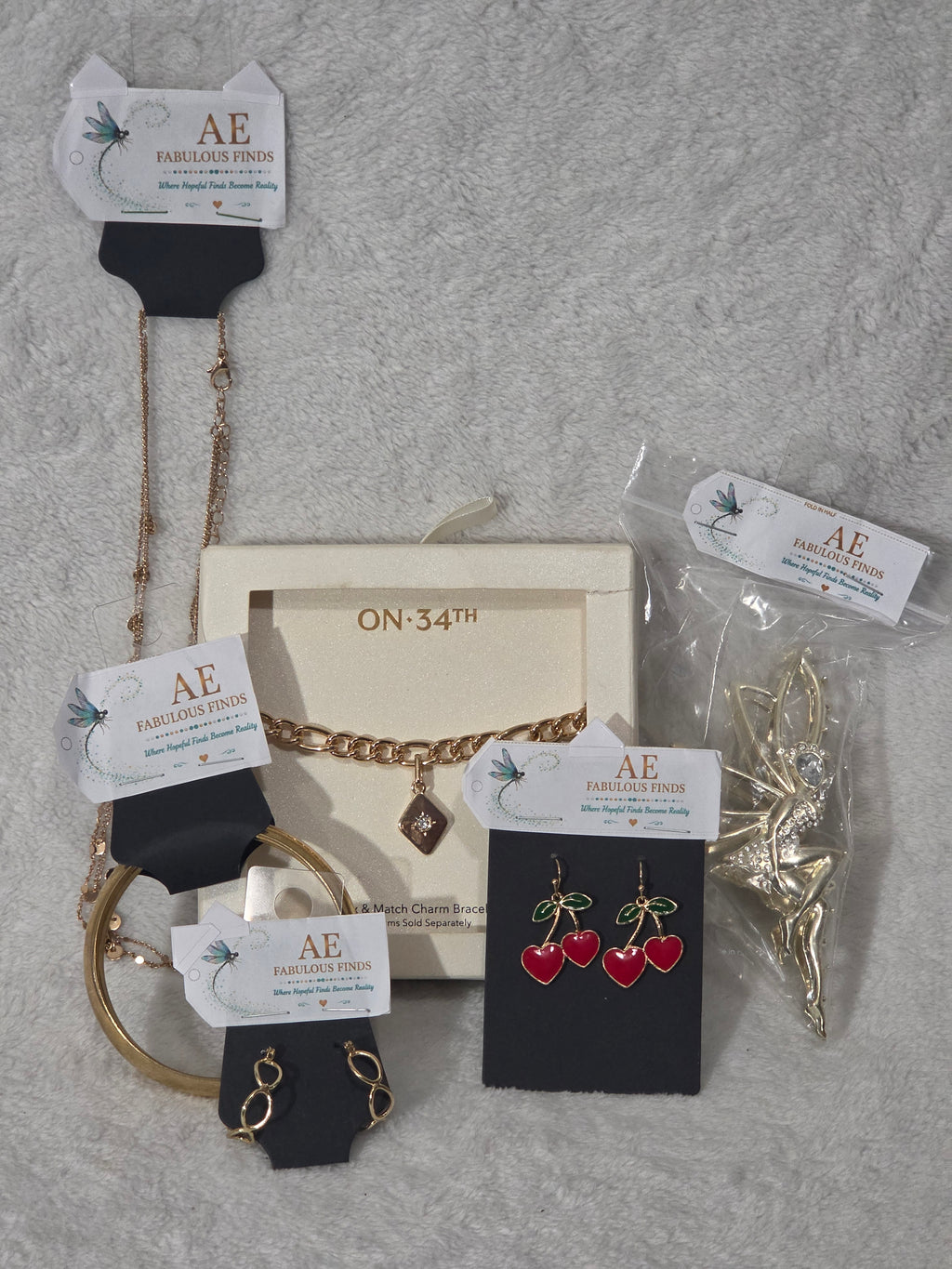 Jewelry Gift Bag Cherry and Gold Charm — front of assembled AEFF bag with red glitter trim and hand-beaded cherry vine