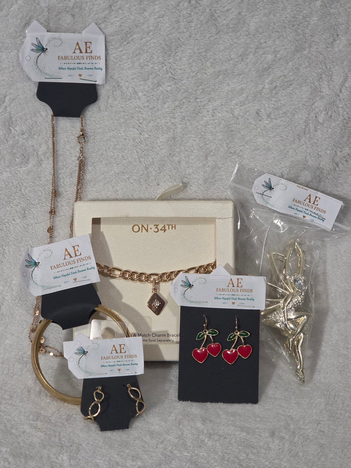Jewelry Gift Bag Cherry and Gold Charm — front of assembled AEFF bag with red glitter trim and hand-beaded cherry vine