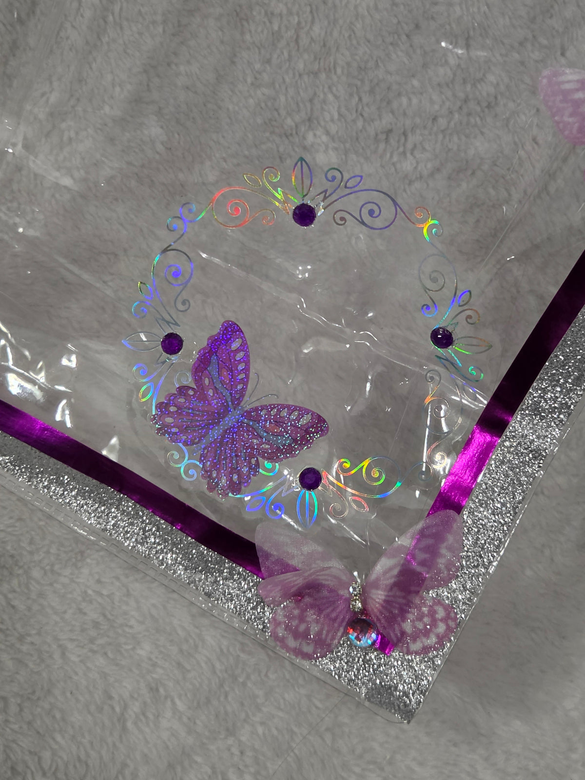 Kuromi Dark Magic bag — sealed and packed showing AEFF thank you card and lavender fuzzy journal through clear bag
