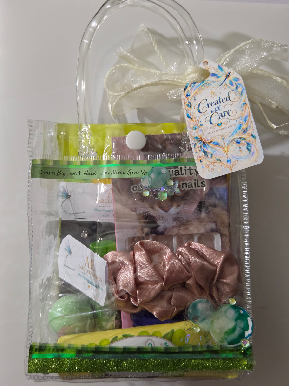 Dream Big green mini spa gift bag with iridescent decorations and AEFF Created with Care tag