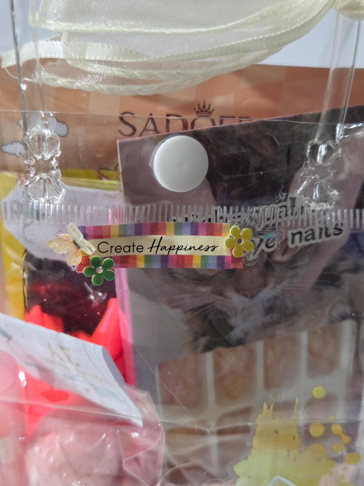 Back of Create Happiness mini spa bag with AEFF thank-you card